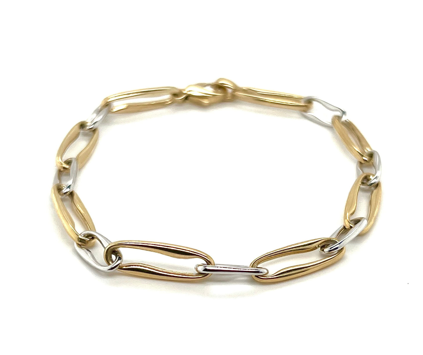 A 9k two-tone link bracelet in yellow and white gold, displayed against a white background.