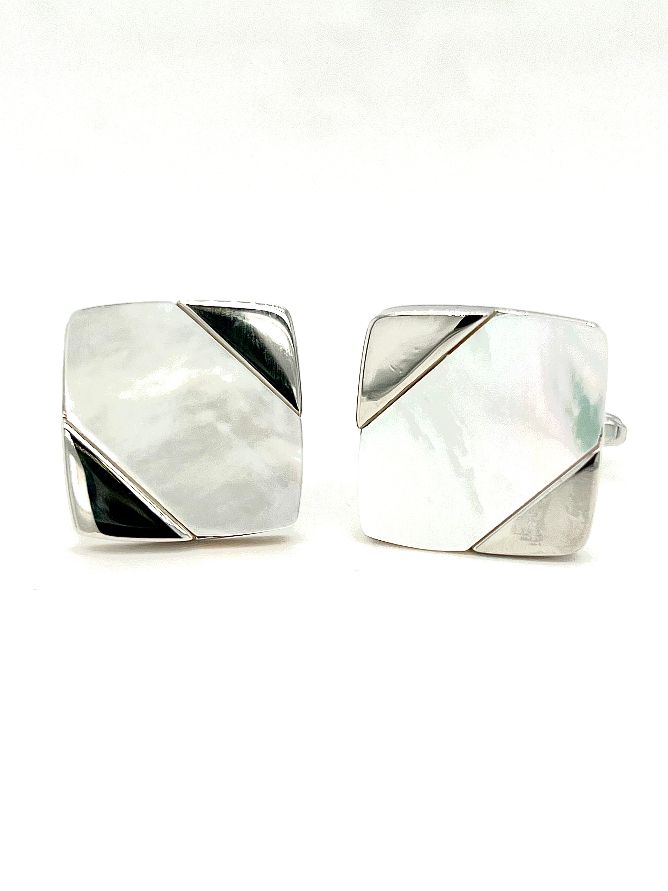 A pair of rhodium-plated diagonal mother of pearl cufflinks with a reflective surface.