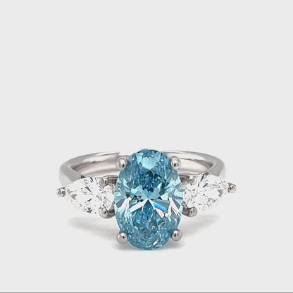Platinum Vivid Blue Lab Grown Trilogy Diamond Ring