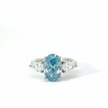 Platinum 3.53cttw Oval Cut Blue Lab Diamond Trilogy Ring