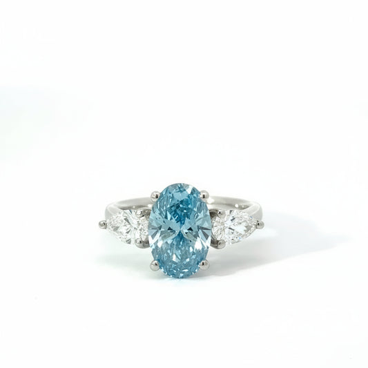 Platinum 3.53cttw Oval Cut Blue Lab Diamond Trilogy Ring