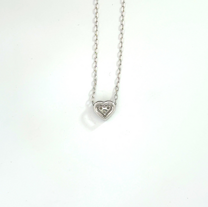 18k White Gold 0.14cttw Princess & Round Brilliant Cut Diamond Heart Pendant