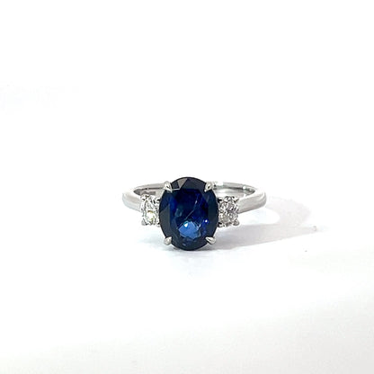 Platinum Oval Cut Blue Sapphire Trilogy Ring