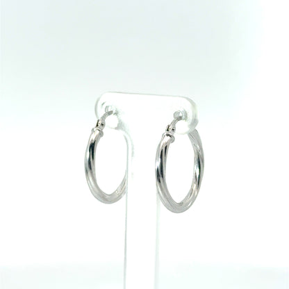 9k White Gold Twist Hoop Earrings