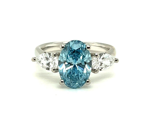 Platinum Vivid Blue Lab Grown Trilogy Diamond Ring