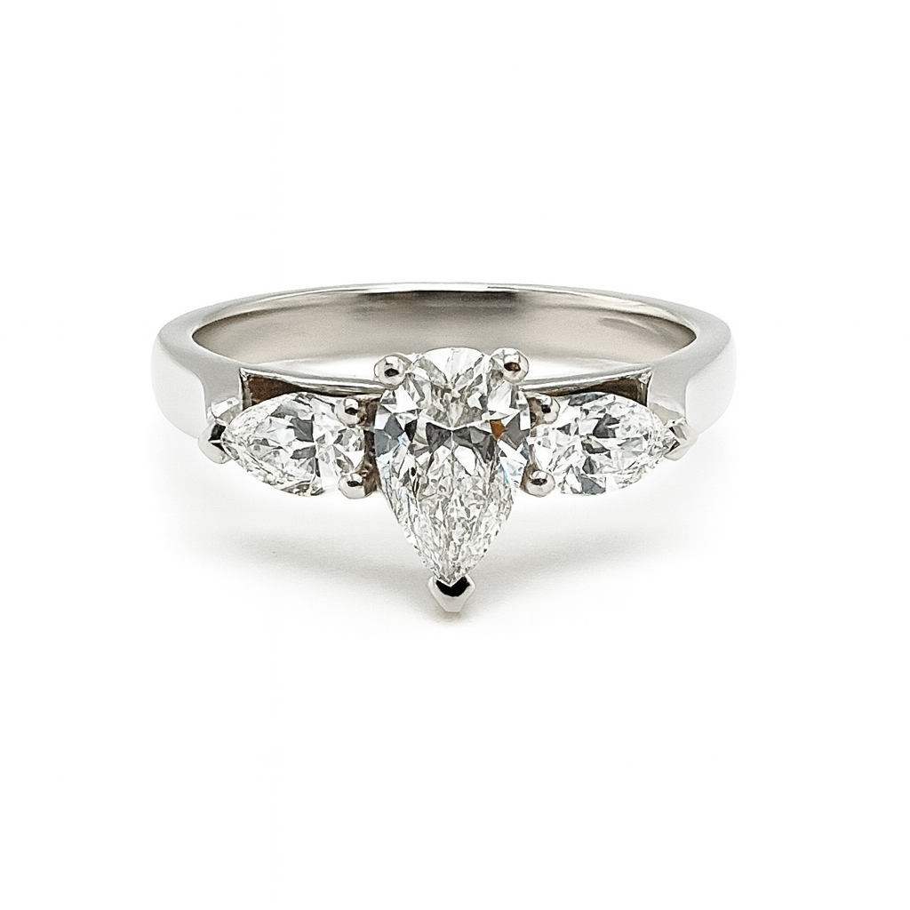 Platinum 0.51ct Pear Shaped Diamond Trilogy Engagement Ring