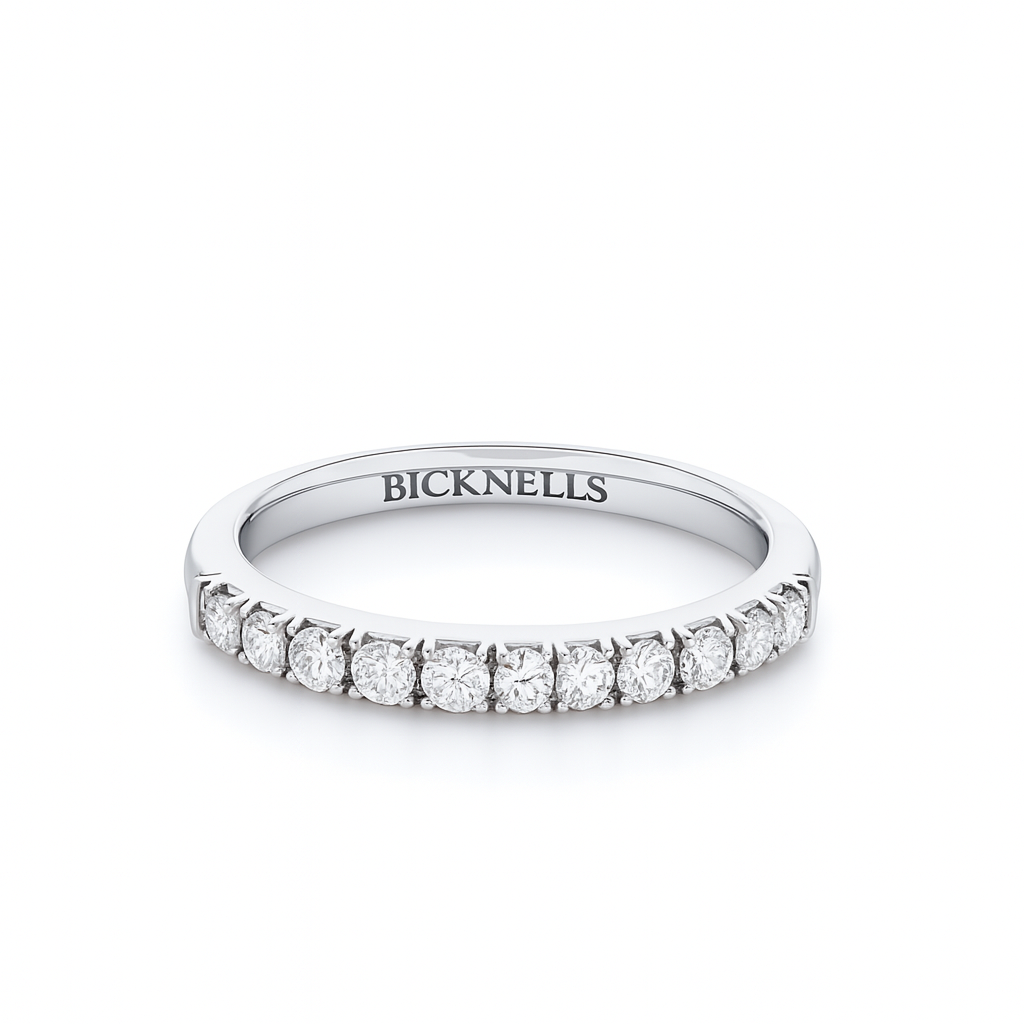 Diamond eternity ring claw set with round diamonds