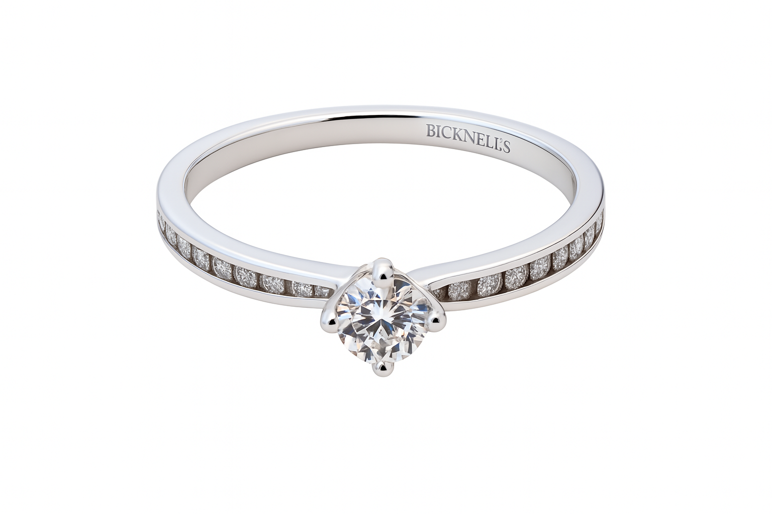 Diamond ring with 'Bicknells' engraving on a white background
