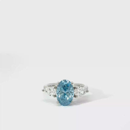 Platinum 3.53cttw Oval Cut Blue Lab Diamond Trilogy Ring