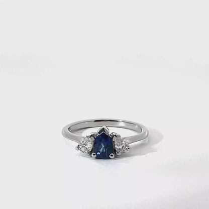 Platinum Pear Cut Blue Sapphire Trilogy Ring